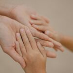 Multiple hands of different sizes layered together